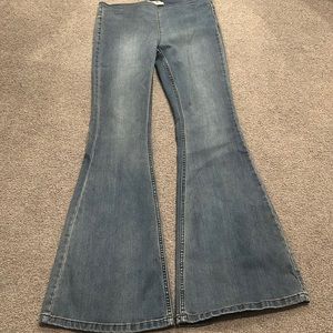 Free People flare leg jeans.